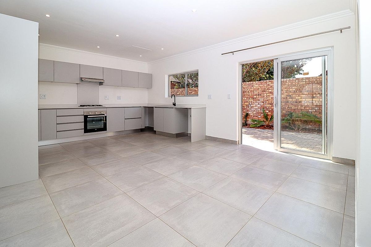 Modern Comfort Meets Secure Garden Living! - Photo 4