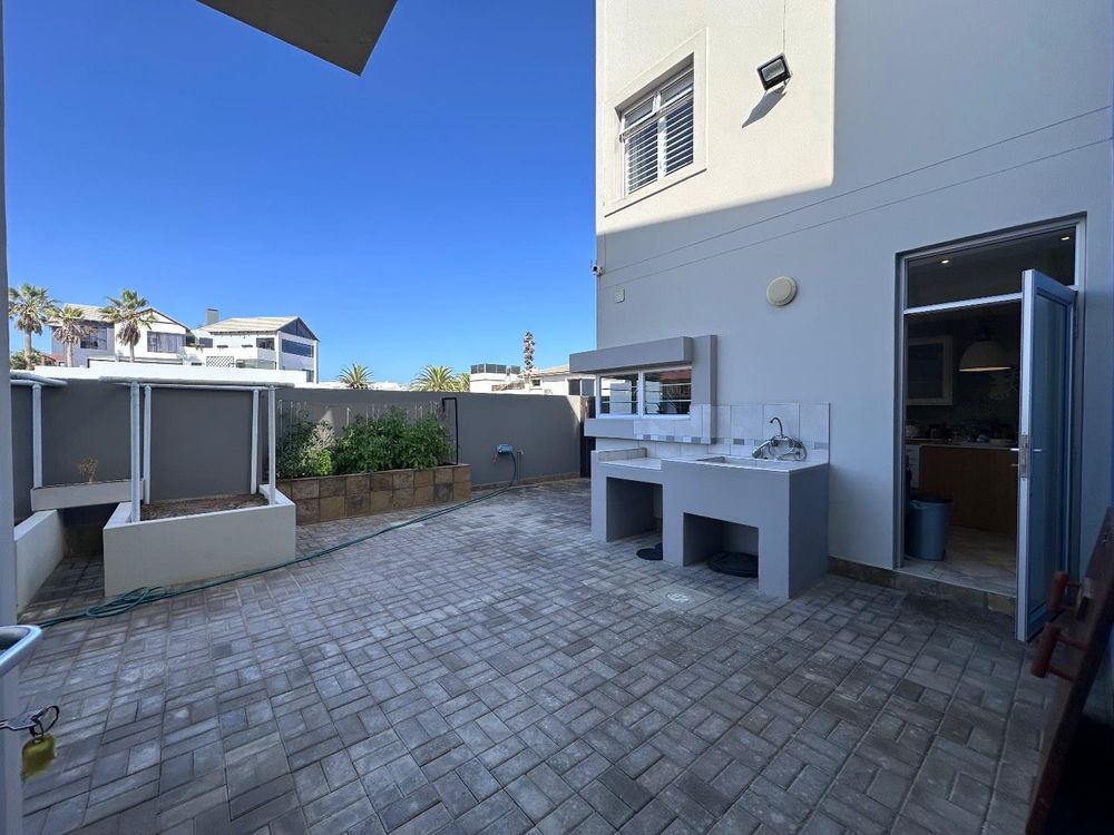 Courtyard with herb plantations and outside washing, cleaning facilities