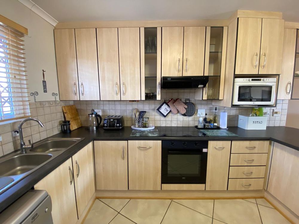 Kitchen with BIC, oven, stove
