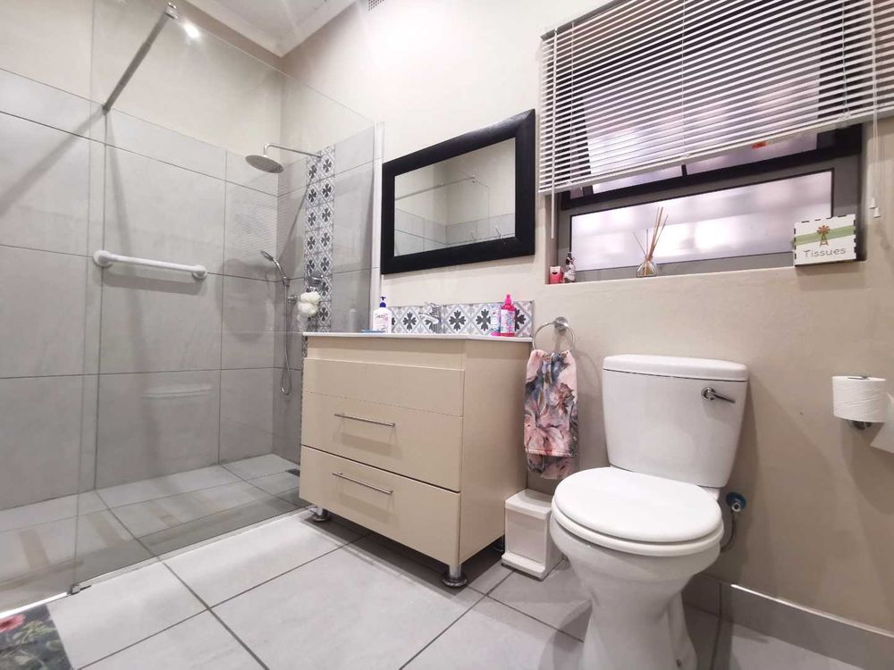 MAIN DWELLING FAMILY BATHROOM WITH SHOWER TOILET BASIN 