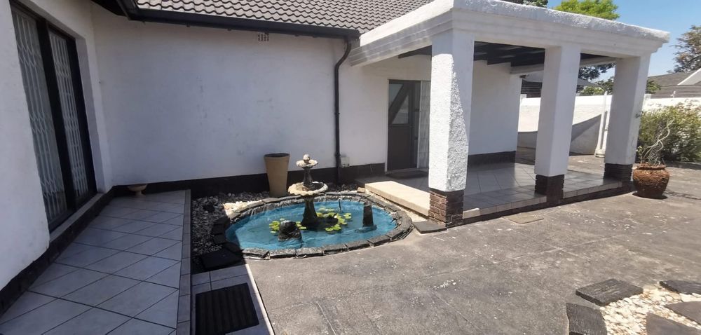 Front door and Koi pond