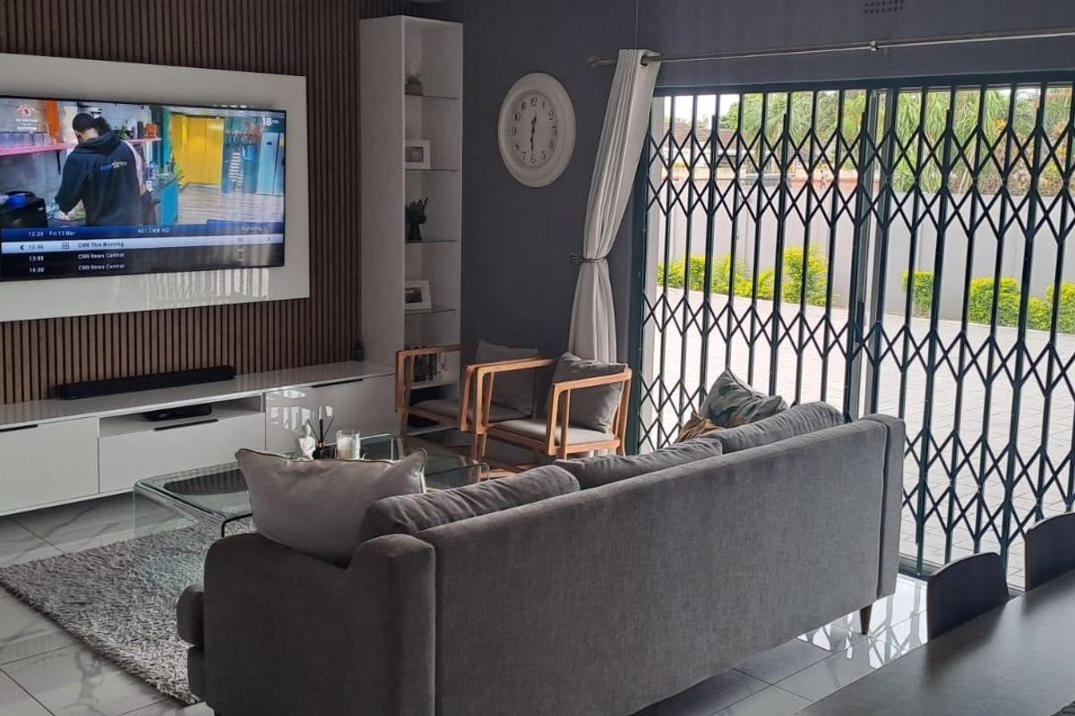 Step into this spacious and well-appointed 4-bedroom home, designed for comfortable family living and effortless entertaining. - Photo 2