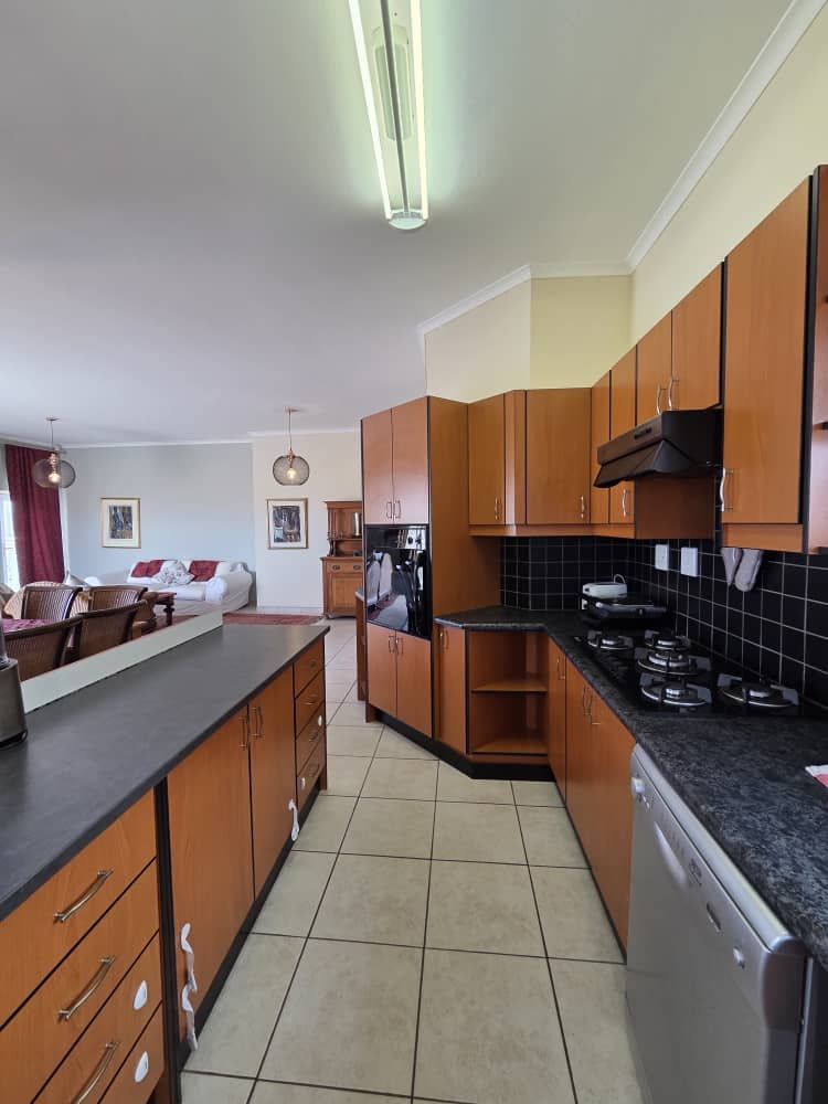 Open plan kitchen with gas stove