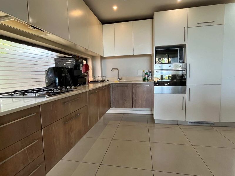 Charming 3-Bedroom Duplex in Zimbali with  Distant Sea Views - Photo 5