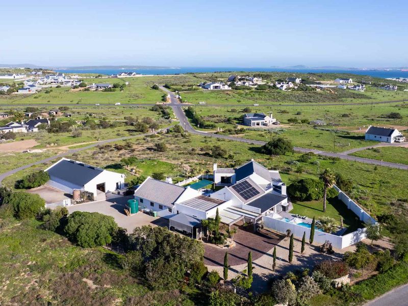 A Rare Lifestyle Estate with Three Properties Offering Space, Luxury and Endless Possibilities at Long Acres in the West Coast - Photo 3