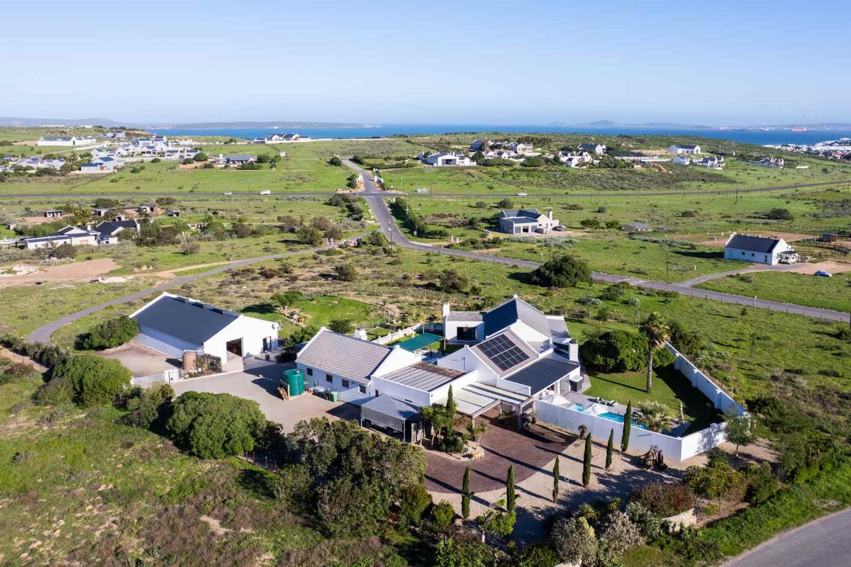 A Rare Lifestyle Estate with Three Properties Offering Space, Luxury and Endless Possibilities at Long Acres in the West Coast - Photo 3