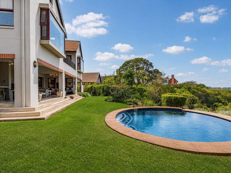 A Home of Sunlight and Heart in Hillcrest's Premier Golfing Estate - Photo 3