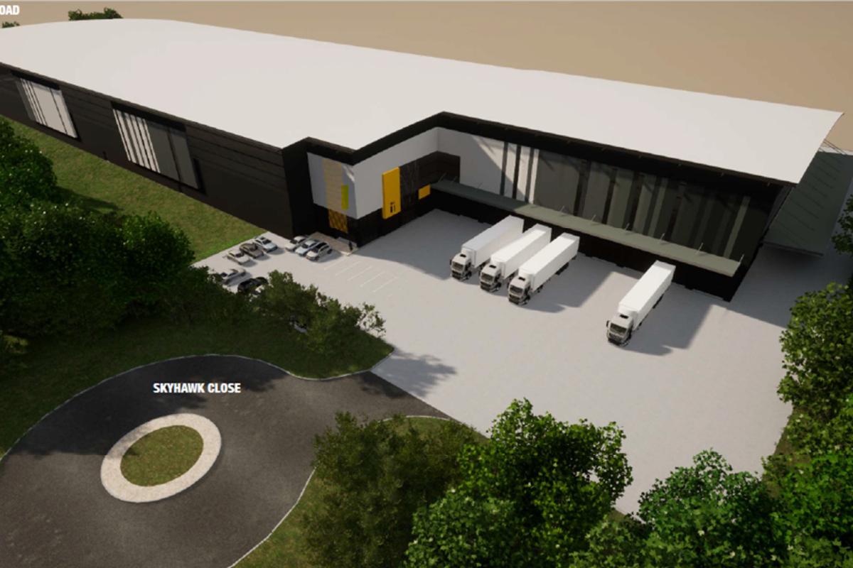 Aerial view of a modern industrial warehouse facility featuring large loading bays, paved yard space, and convenient access from Skyhawk Close.