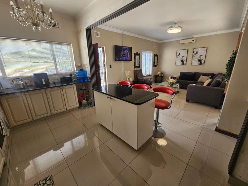 Four-Bedroom Family Home with Secure Parking in Austerville - Photo 6