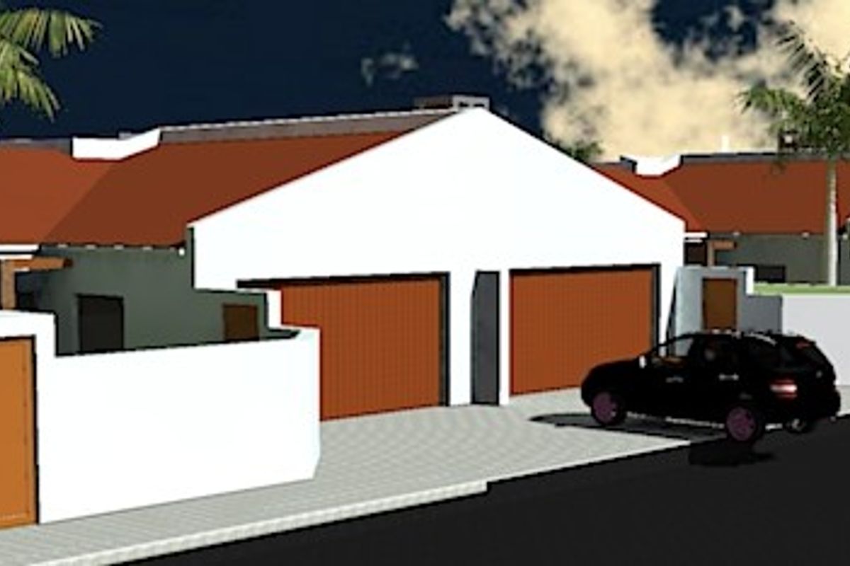 A 3D rendered perspective of a townhouse complex featuring multiple units with garages, tiled roofs, and boundary walls.