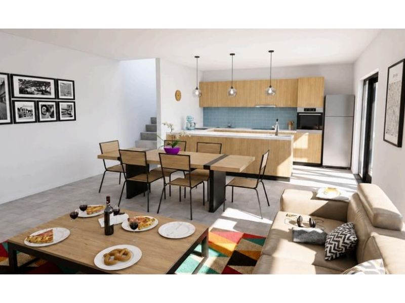Modern open-plan living and dining area featuring a contemporary kitchen with light wood cabinetry, integrated appliances, and a functional island layout.
