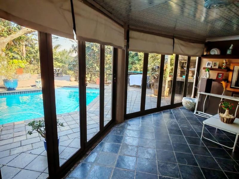 A Rare Double-Storey Home with Breathtaking Golf Course Views. - Photo 2