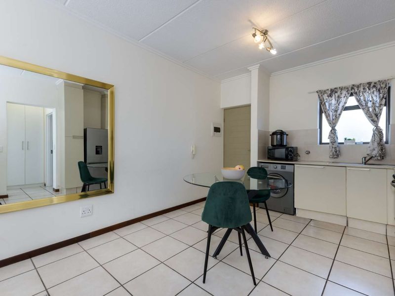 A WELL- POSITIONED MIDDLE FLOOR UNIT IN SOUGHT AFTER TEQUILA SUNRISE - Photo 5