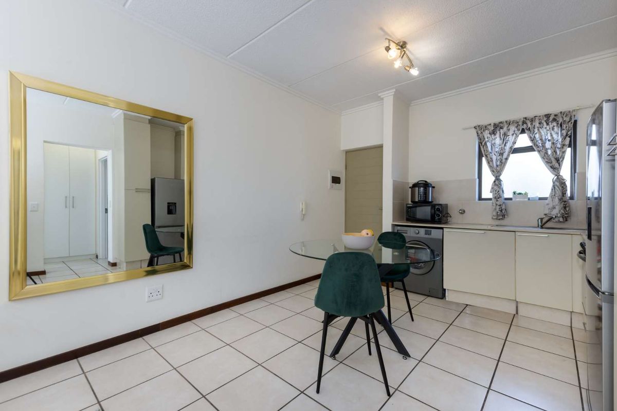 A WELL- POSITIONED MIDDLE FLOOR UNIT IN SOUGHT AFTER TEQUILA SUNRISE - Photo 5