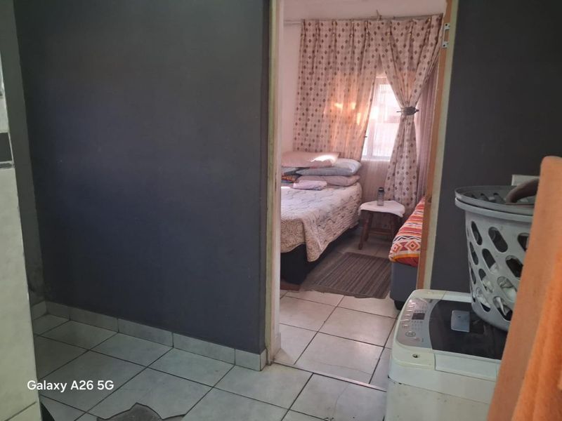 Spacious Family Home with Income-Generating Granny Flat - Photo 8