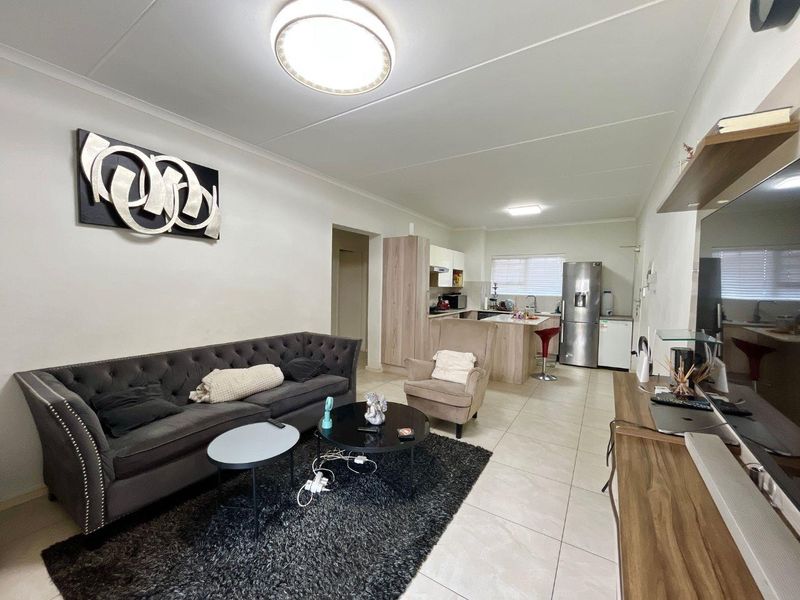 Live in Style at Orchid Ridge: Ground-Floor Delight! - Photo 2