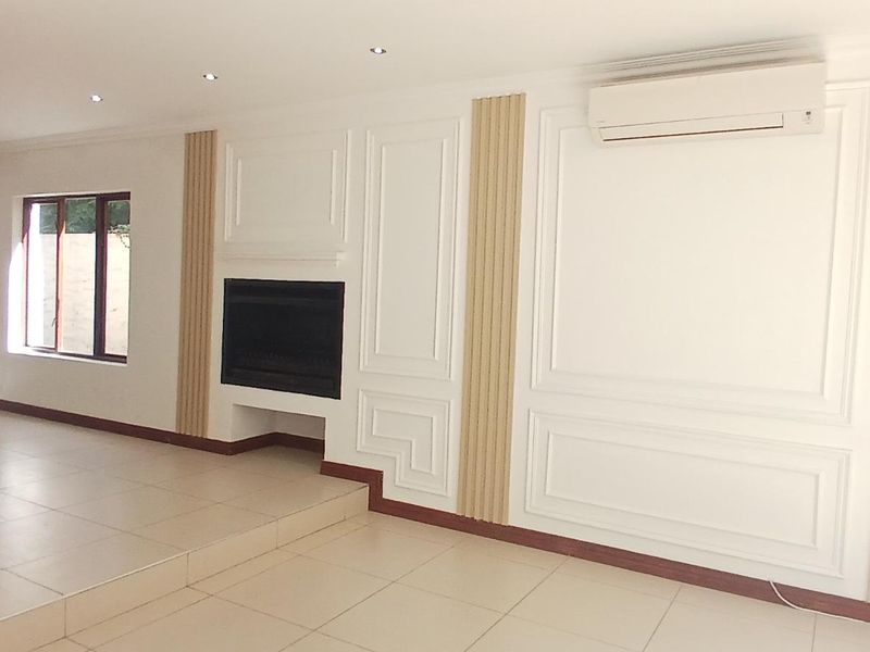 Modern Elegance in a Secure and Sought-After Estate - Photo 6