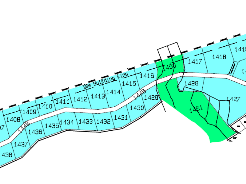 A detailed site layout plan showing multiple commercial land plots, road access, and building lines for the development.