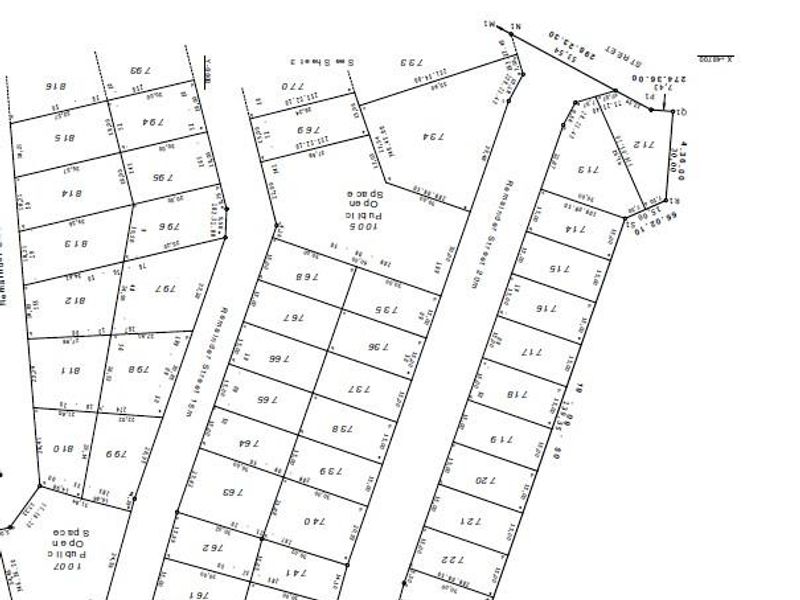 A detailed cadastral survey map showing the layout and boundaries of multiple commercial land plots.
