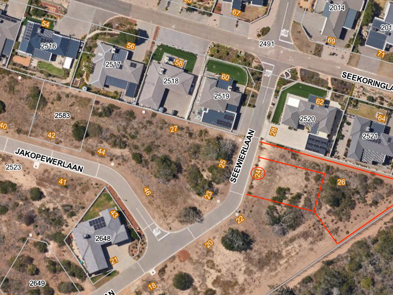 Aerial view of a vacant residential plot located at the corner of Seewierlaan, showing the site boundaries and surrounding neighborhood context.