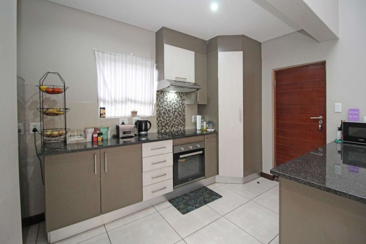 This is it! Beautiful 2 Bedroom 2 Bathroom Townhouse in a Secure Estate - Photo 4