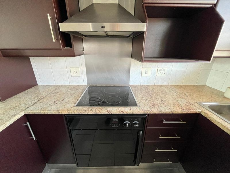 "Modern Two-Bedroom Flat Awaits: Secure, Stylish, and Move-In Ready - Photo 5