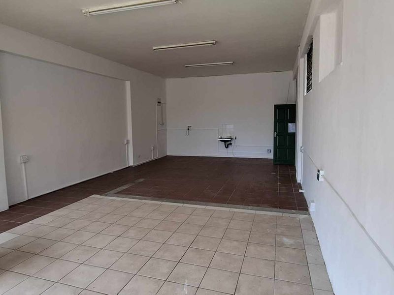 **Prime Business Opportunity in a Strategically Designed Shopping Center** - Photo 3