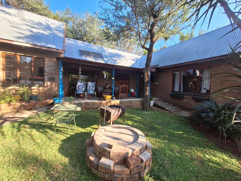 Charming Sunlit Home with Lush Garden in Prime Location - Photo 8