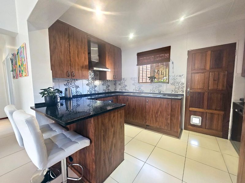 A Rare Gem in the Sought-After Caribbean Estates - Photo 10