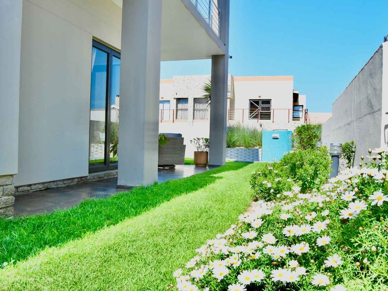 Spacious 4-Bedroom Family Home with Boma & Jacuzzi in prime location - Photo 9