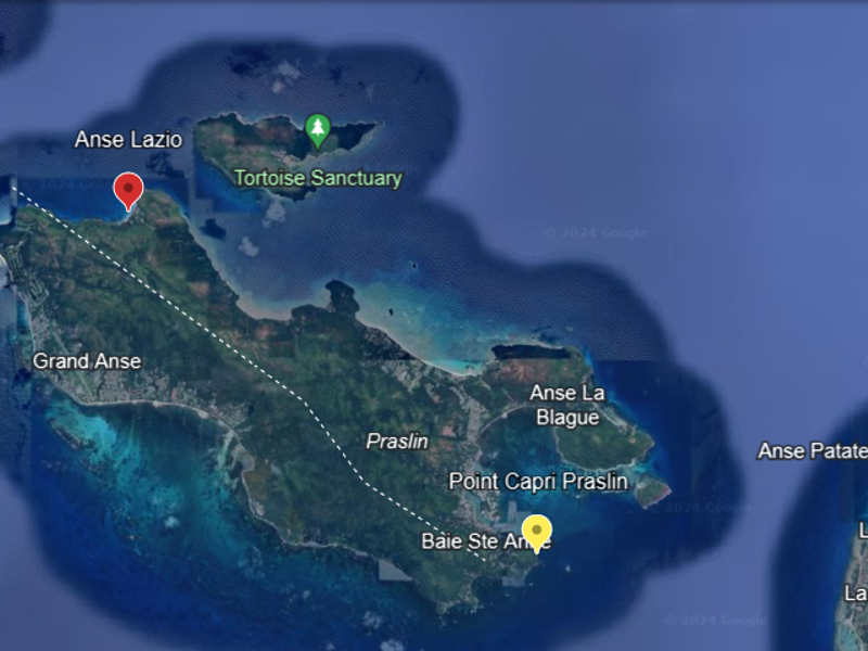 An aerial satellite view of Praslin Island in the Seychelles, showing geographical landmarks and surrounding islands.