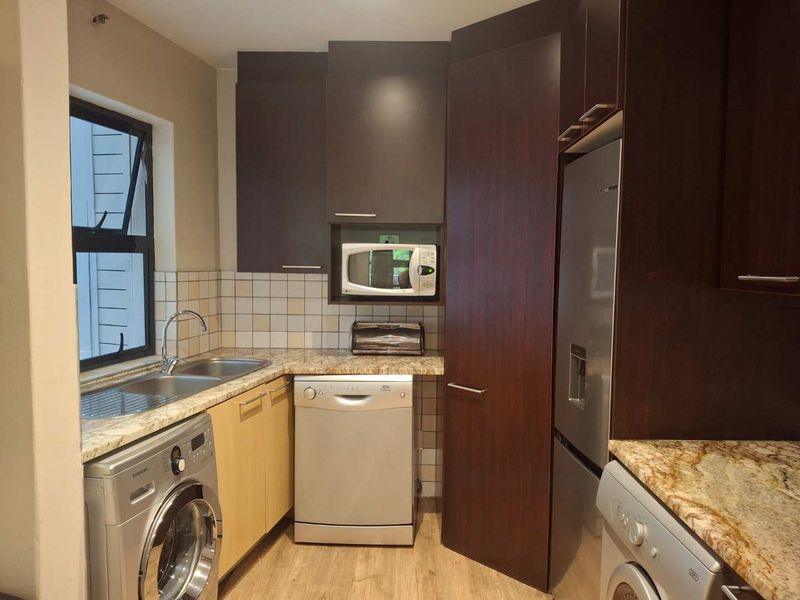 A TASTEFULLY FURNISHED TWO BEDROOM APARTMENT - Photo 9