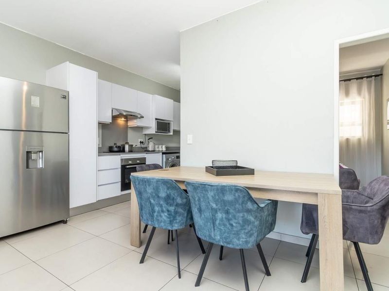 MODERN APARTMENT AWAITS YOU - Photo 3