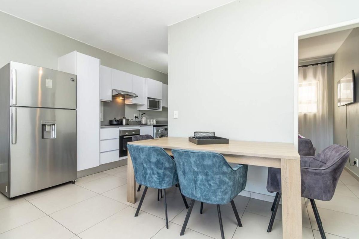 MODERN APARTMENT AWAITS YOU - Photo 3