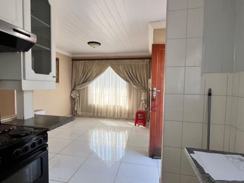 Cook, Relax, and Feel Safe in This Stunning 2-Bedroom Home - Photo 4