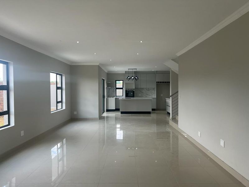 Elegant 4-Bedroom Home in Zambezi Manor Estate - Photo 2