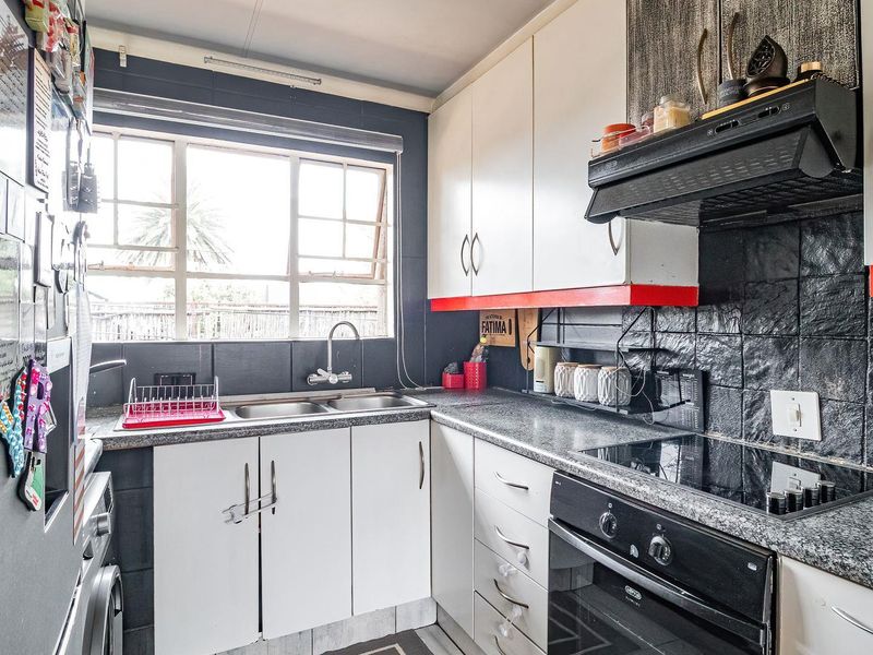 First Floor 2-Bedroom with a Balcony & Carport! - Photo 6