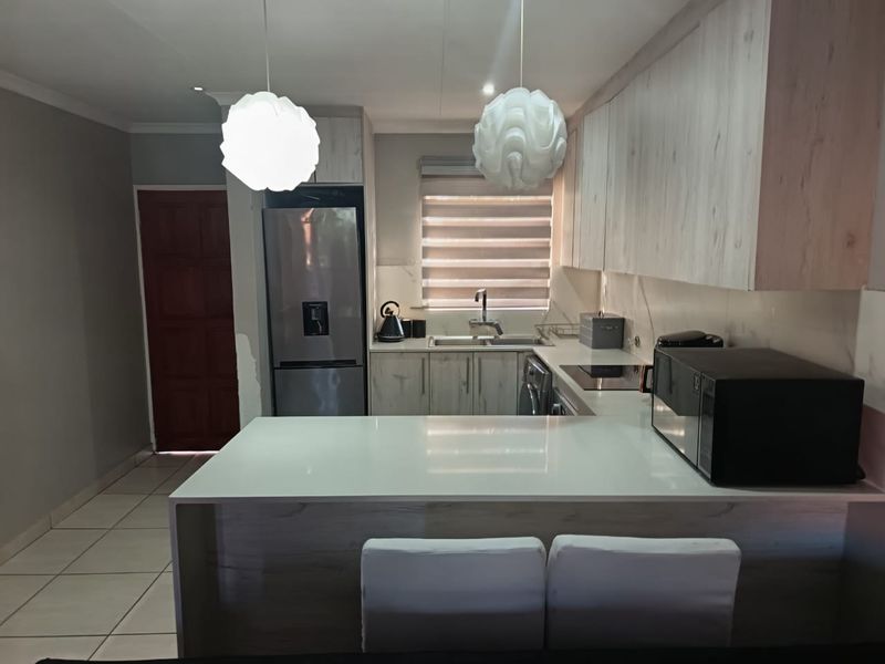 Rare find, Completely Redone 2-Bedroom townhouse with Private Garden in Security Complex. Exclusively Marketed by Sashen Moodley. - Photo 6