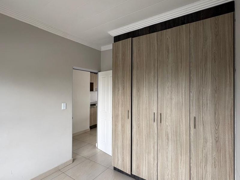 Modern two bedroom unit with one full batroom & braai - Photo 6