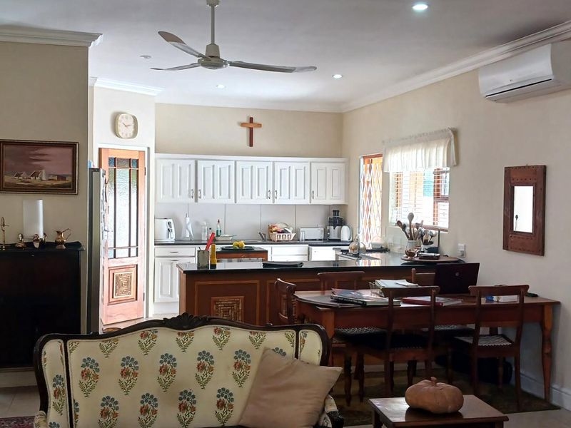 A tranquil setting complements this well established home - Photo 3