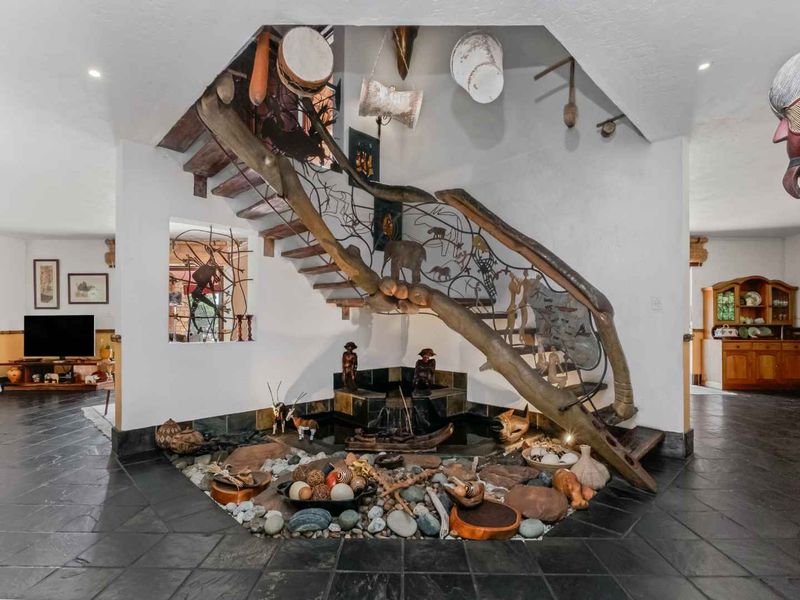 AN EXQUISITE, BUSH LODGE-THEMED, FAMILY SANCTUARY OFFERING TIMELESS ELEGANCE AND UNMATCHED TRANQUILITY IN A SERENE INDIGENOUS GARDEN SETTING - Photo 8