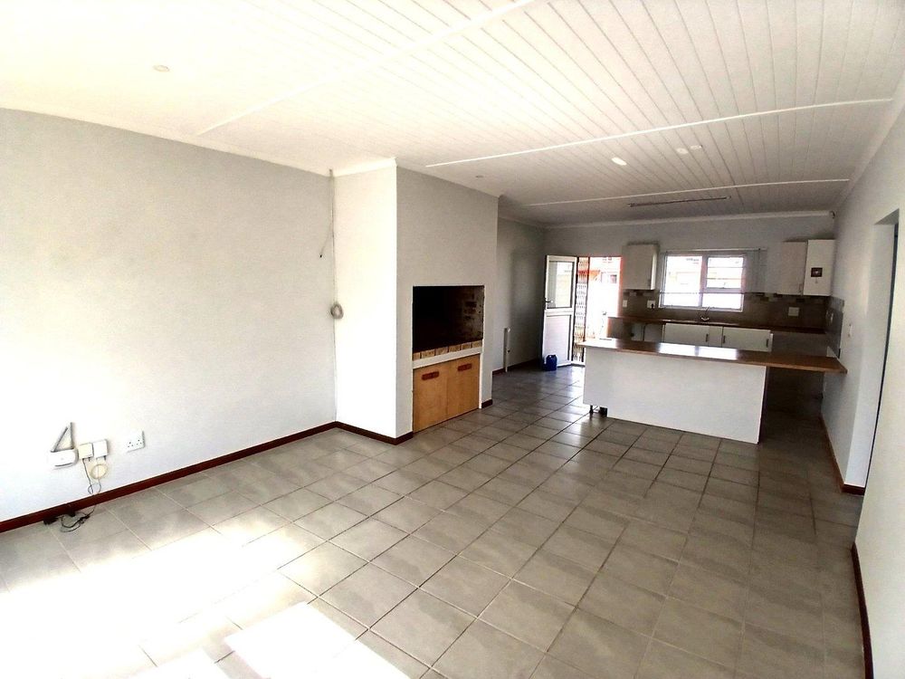 Living Area (with Kitchen at the back) - as from front Door.