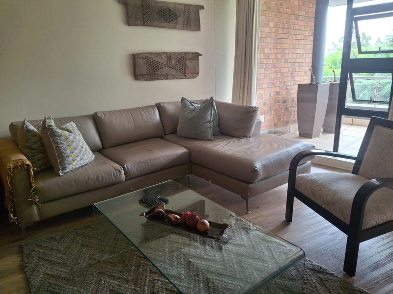 A BEAUTIFULLY FURNISHED TWO BEDROOM FURNISHED APARTMENT - Photo 2