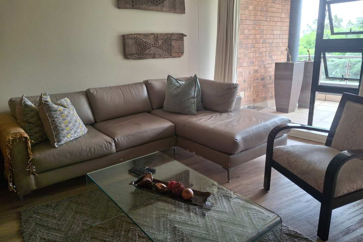 A BEAUTIFULLY FURNISHED TWO BEDROOM FURNISHED APARTMENT - Photo 2