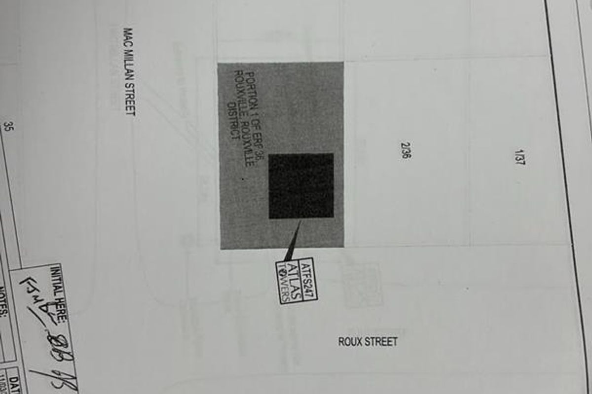 A site plan document showing the layout and positioning of the property within the surrounding street network.