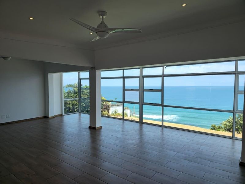 Sun-Soaked Modern Home with 5 Bedrooms &amp; Jaw-Dropping Sea Views - Photo 2