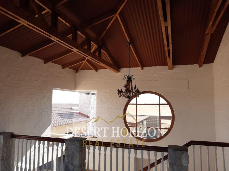 Erongo , Rossmund | Charming Double-Storey Home with Modern Amenities and Scenic Surroundings - Photo 8