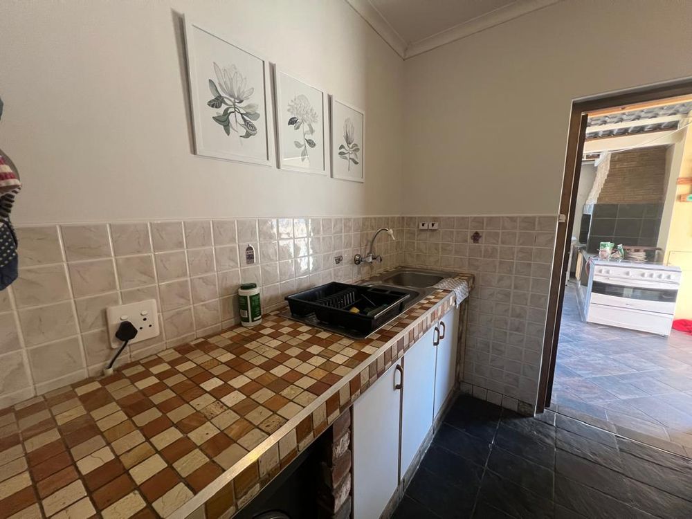 Scullery and door leading to entertainment area