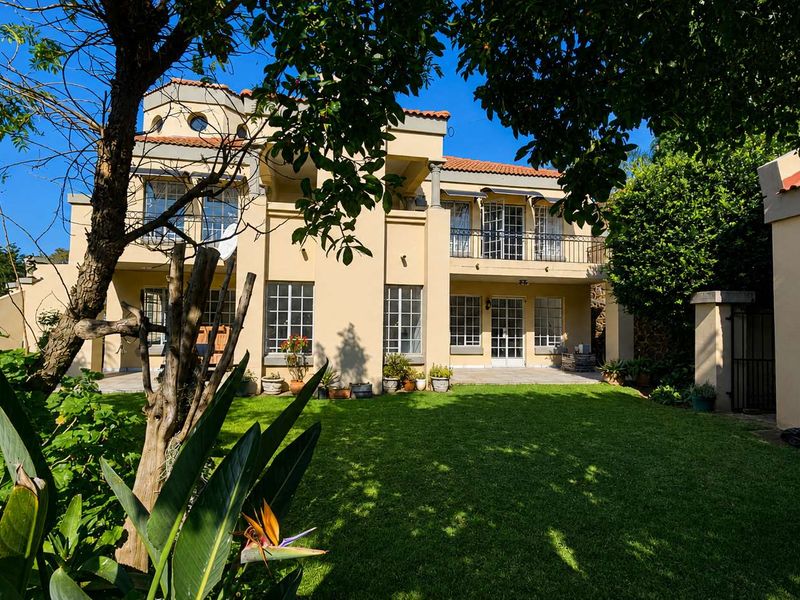Spacious and Versatile 5 Bedroom Mediterranean Style House - Photo 1