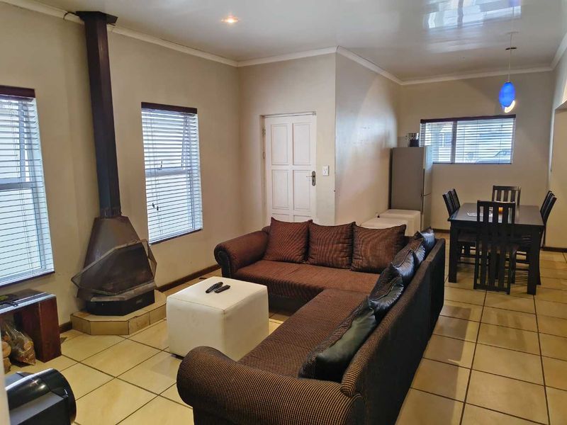 Charming 3-Bedroom Family Home in Stone River Valley Estate Paarl - Photo 6